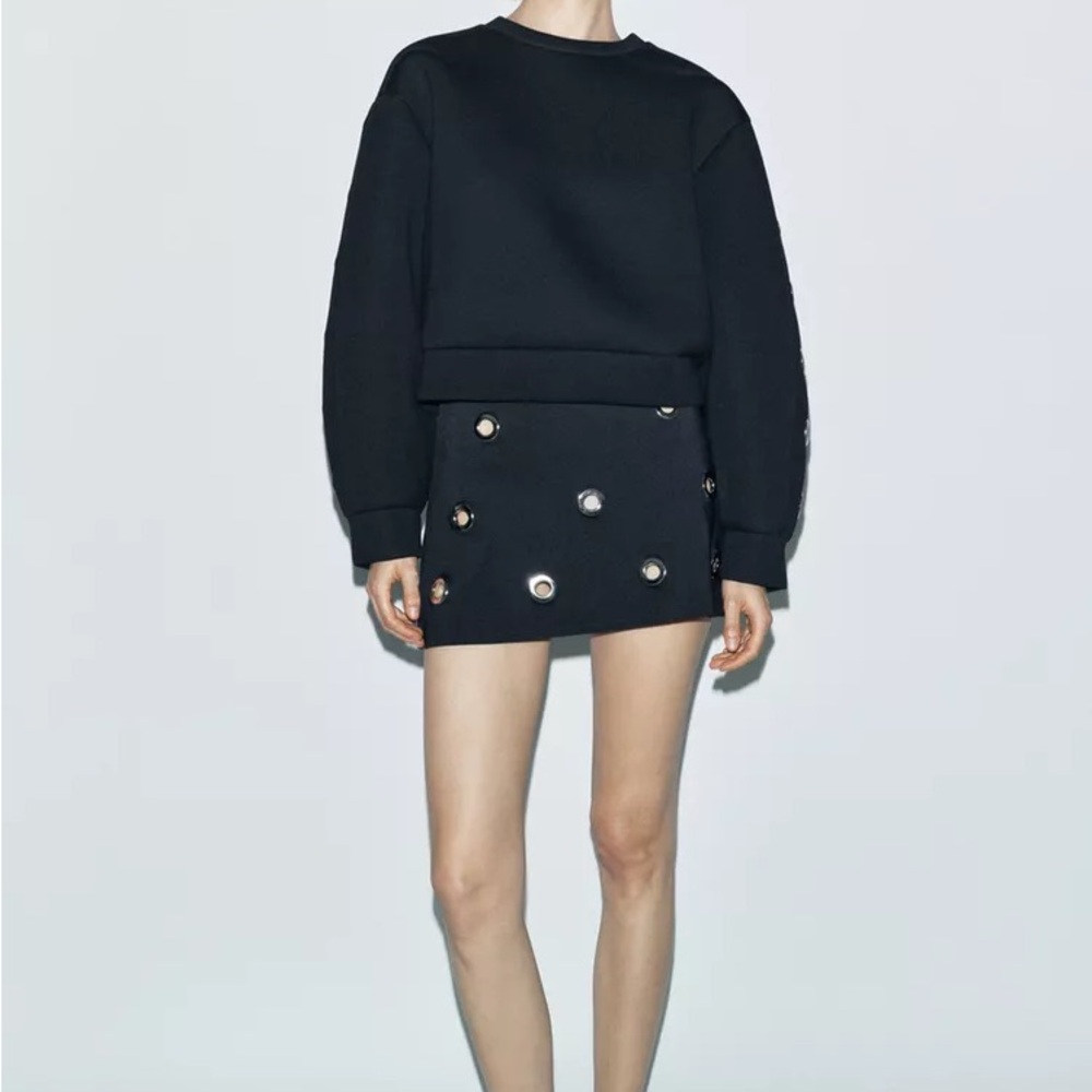 Black Mini Skirt with Metallic Grommet Accents